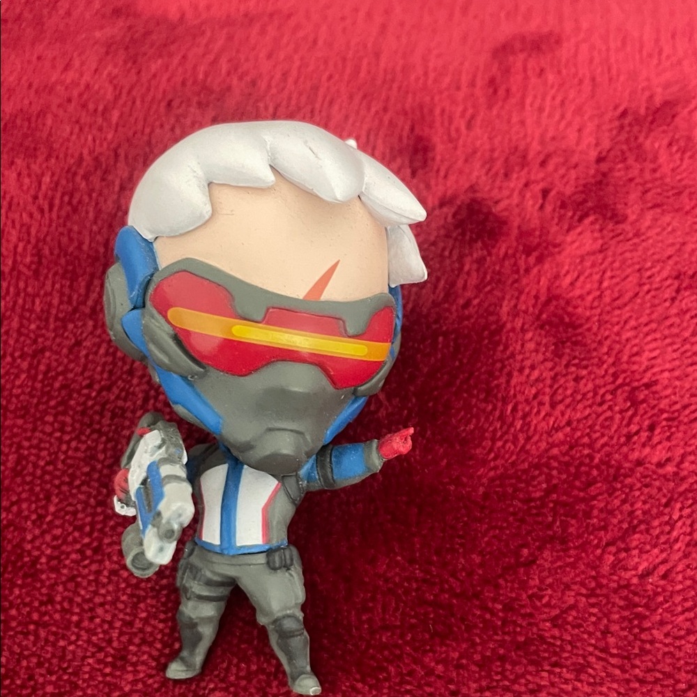 Action Figure with Red and Blue Accents
